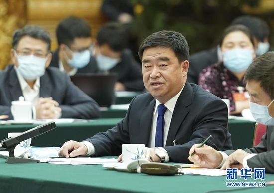 5月22日，全國人大代表薛志國參加內蒙古代表團的審議并發(fā)言。新華社記者 黃敬文 攝