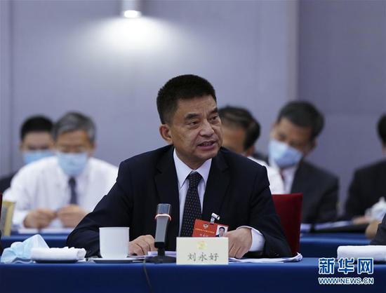  5月23日，全國政協(xié)委員劉永好在政協(xié)聯(lián)組會(huì )上發(fā)言。新華社記者 謝環(huán)馳 攝