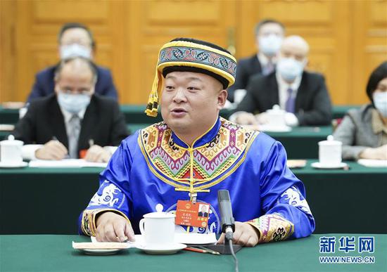  5月24日，全國人大代表宋慶禮參加湖北代表團的審議并發(fā)言。新華社記者 黃敬文 攝